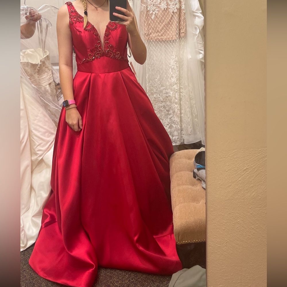 NWT. been in dust bag since bought.
No alterations done.